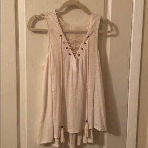 Cream colored tank with beautiful detailing